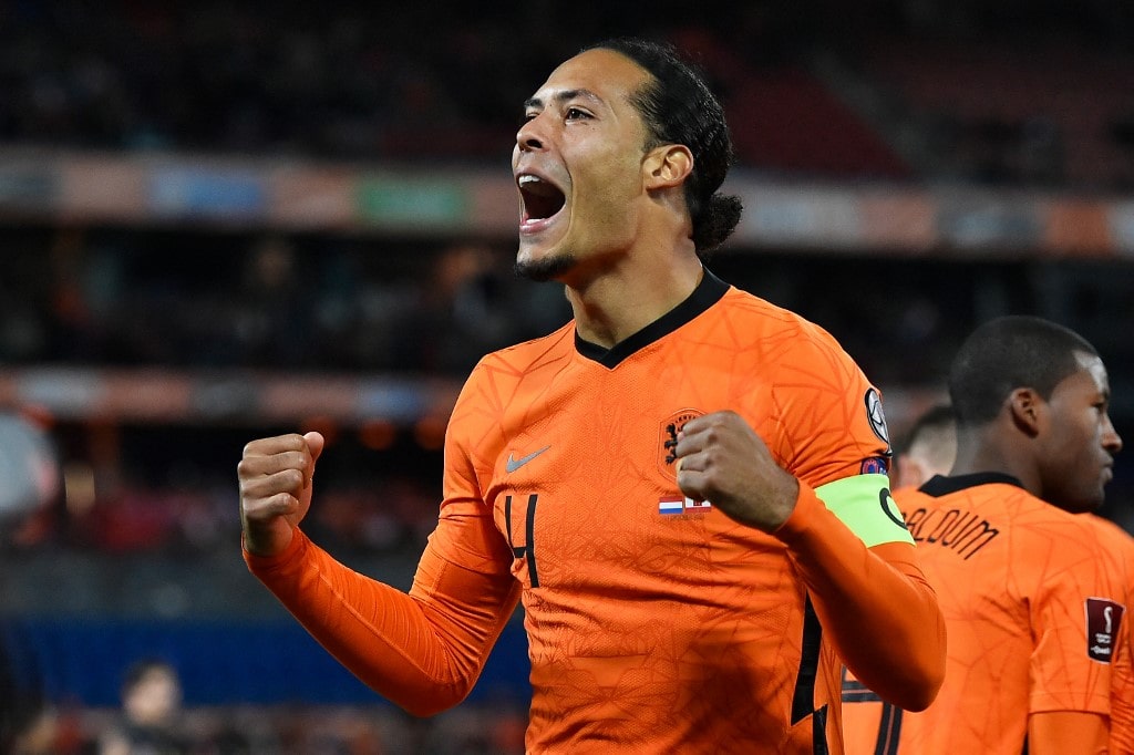 Netherlands' defender Virgil van Dijk celebrates scoring his team's first goal during the FIFA World Cup Qatar 2022 qualification group G football match between The Netherlands and Gibraltar at De Kuip stadium, in Rotterdam, on October 11, 2021.