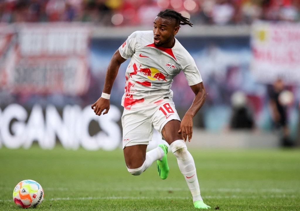 Leipzig's French midfielder Christopher Nkunku plays the ball during the friendly football 