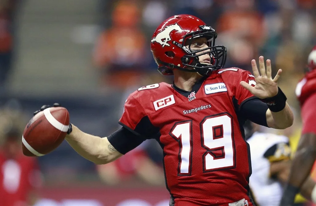 Bo Levi Mitchell #19 of the Calgary Stampeders throws a pass against the Hamilton Tiger-Cats during the 102nd Grey Cup Championship