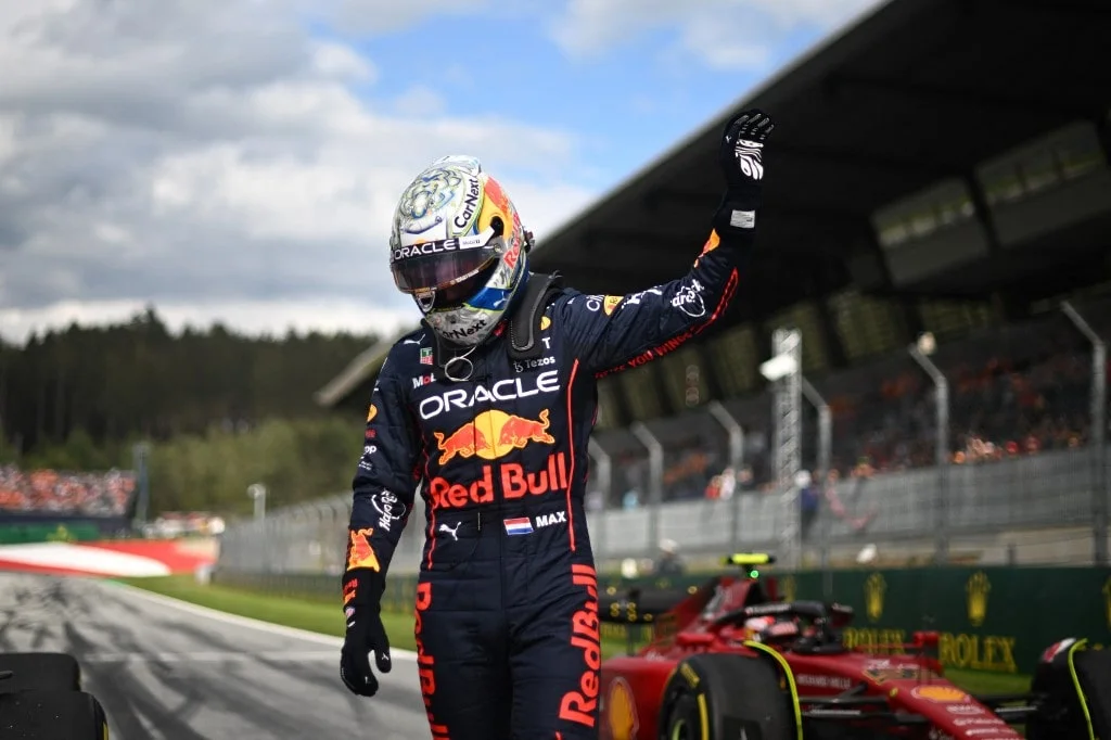 Red Bull Racing's Dutch driver Max Verstappen celebrates after taking the pole position after the sprint qualifying at the Red Bull Ring race track in Spielberg