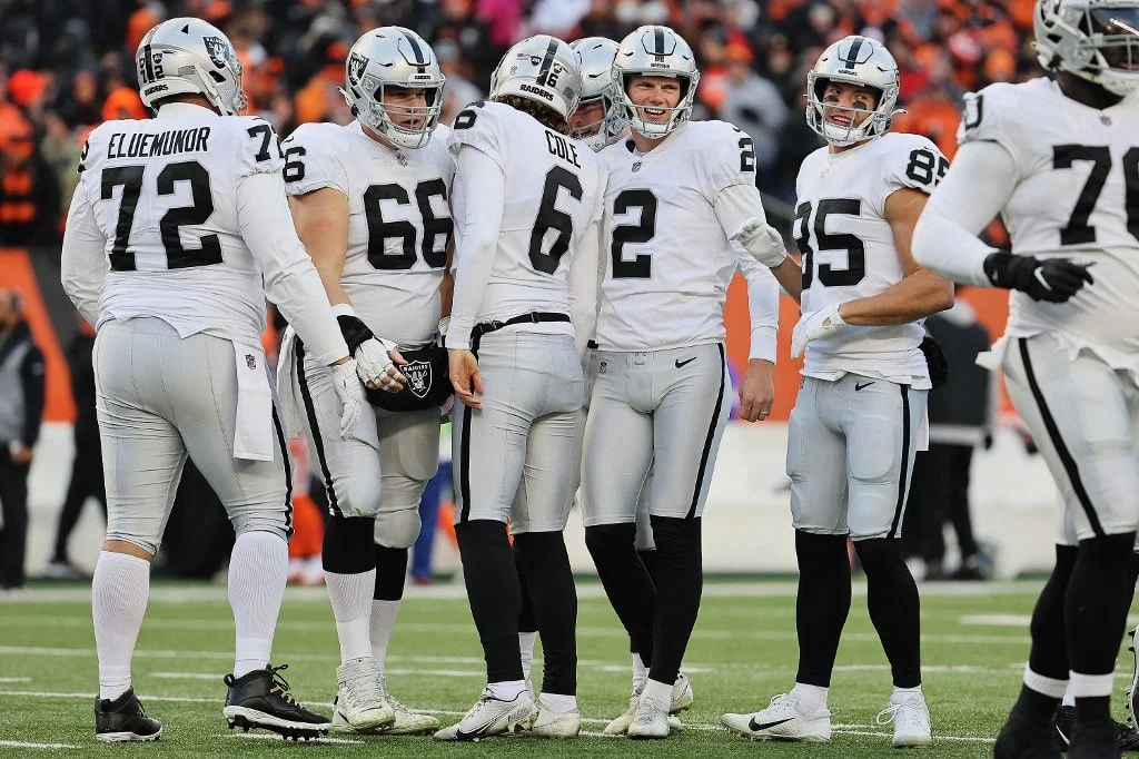 Kicker Daniel Carlson #2 of the Las Vegas Raiders celebrates after kicking a first quarter field goal against the Cincinnati Bengals during the AFC Wild Card playoff game