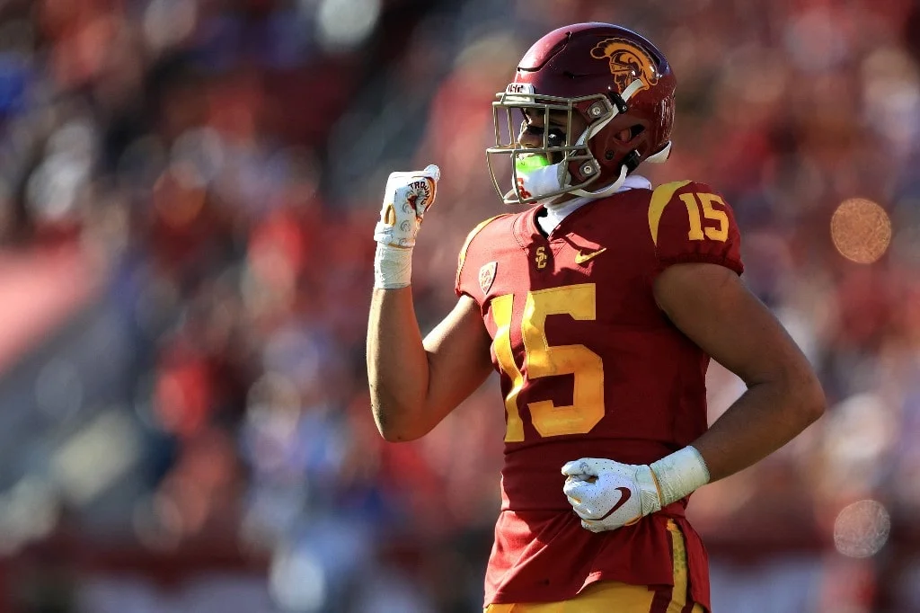 Drake London #15 of the USC Trojans reacts after a USC touchdown during the first half of a game against the UCLA Bruins