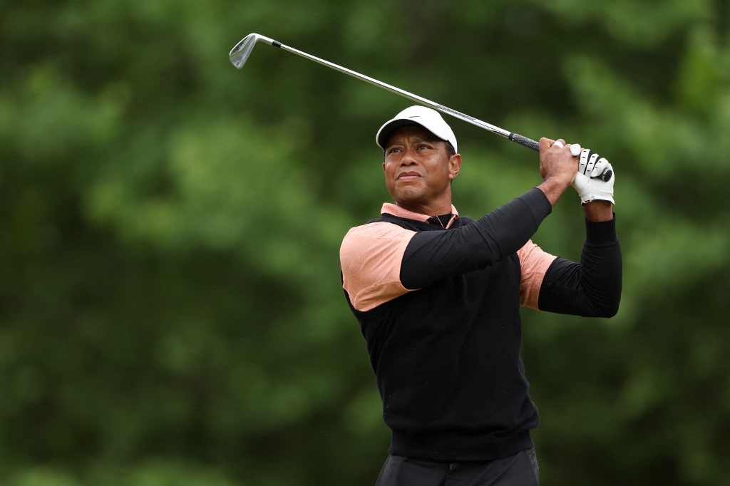  Tiger Woods of the United States plays his shot from the 14th tee during the third round of the 2022 PGA Championship 