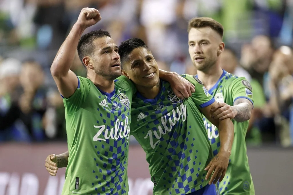Nicolás Lodeiro #10 and Albert Rusnák #11 celebrate a goal by Raúl Ruidíaz #9 of Seattle Sounders against Pumas in the second half during 2022 Scotiabank Concacaf Champions League Final Leg 2