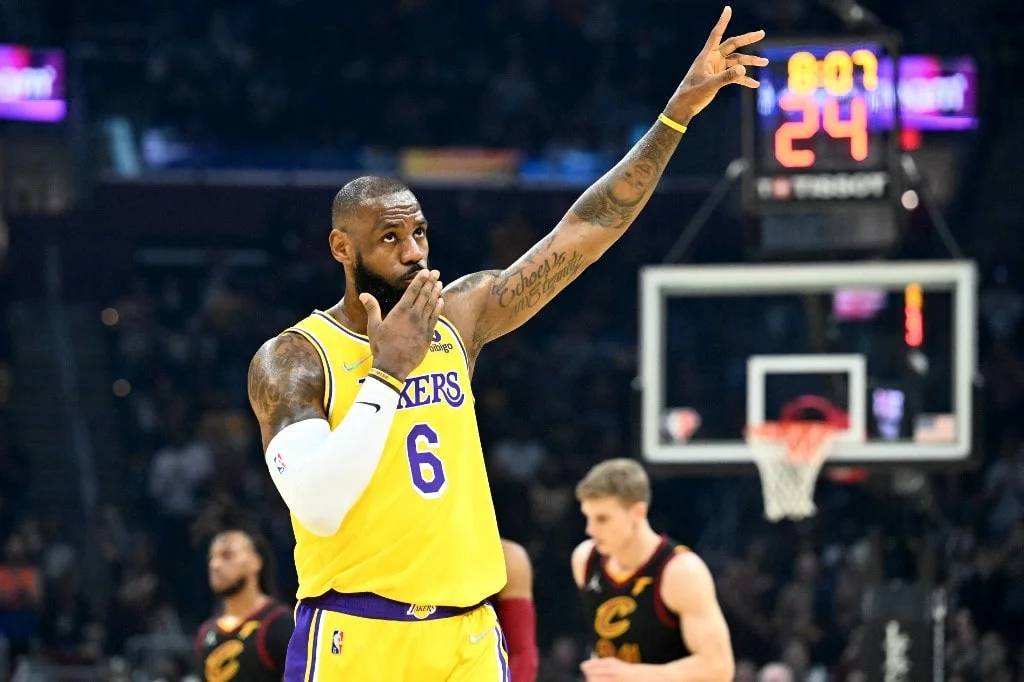 LeBron James #6 of the Los Angeles Lakers waves to the crowd during the first quarter against the Cleveland Cavaliers