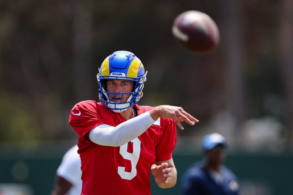 Matthew Stafford #9 of the Los Angeles Rams attempts a pass during training camp at University of California Irvine