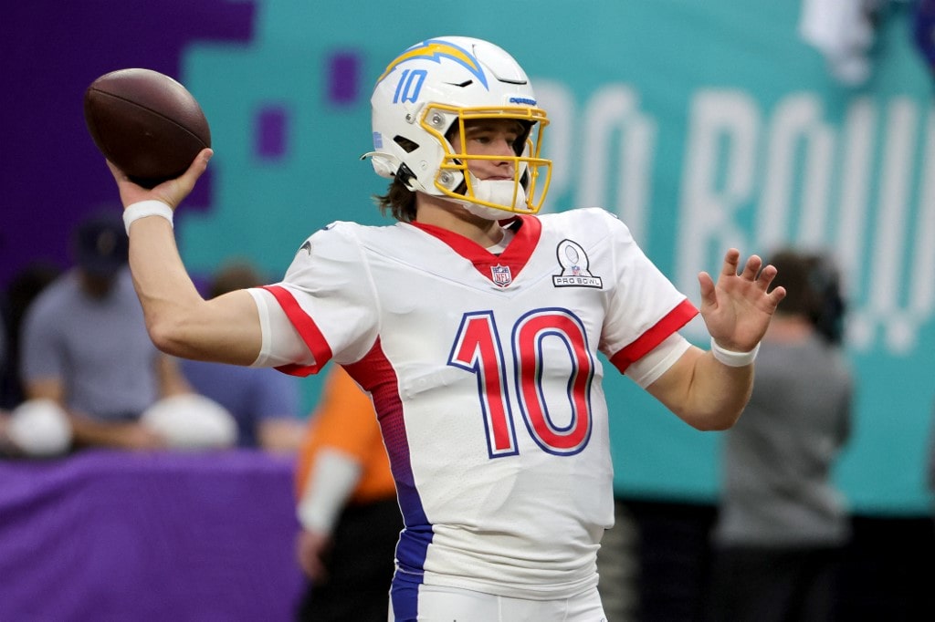 Justin Herbert #10 of the Los Angeles Chargers warms up before the 2022 NFL Pro Bowl