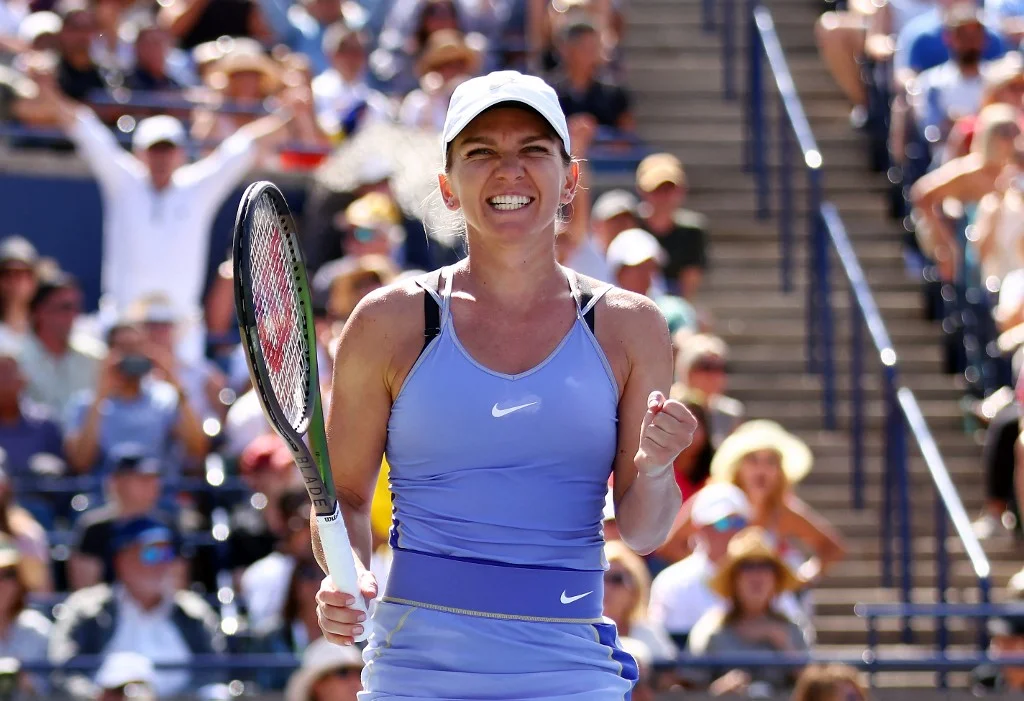 Simona Halep of Romania celebrates her victory