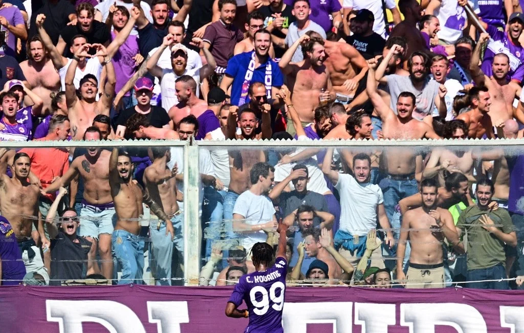 Fiorentina's Christian Kouame goes to celebrate with fans