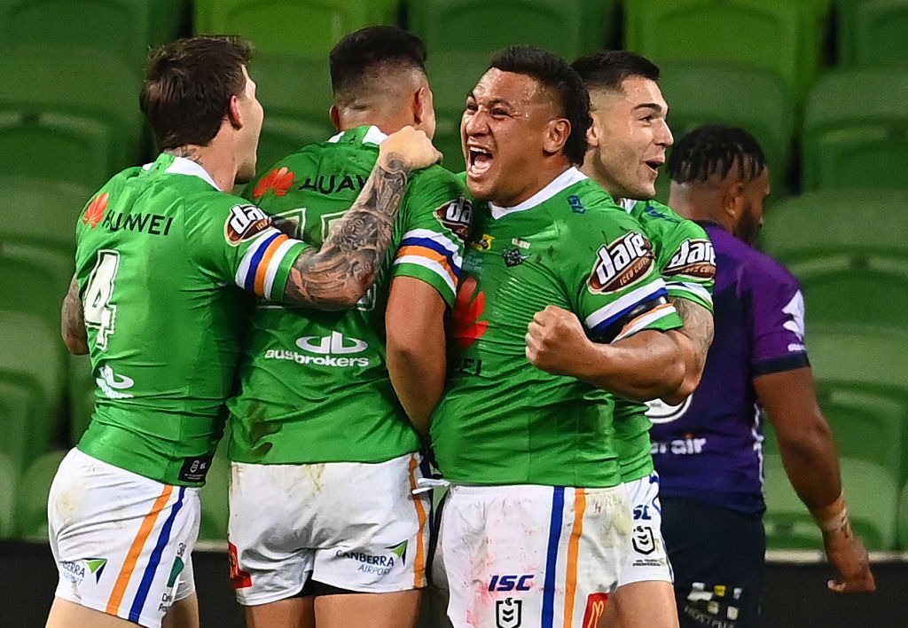 Canberra Raiders players celebrating after scoring