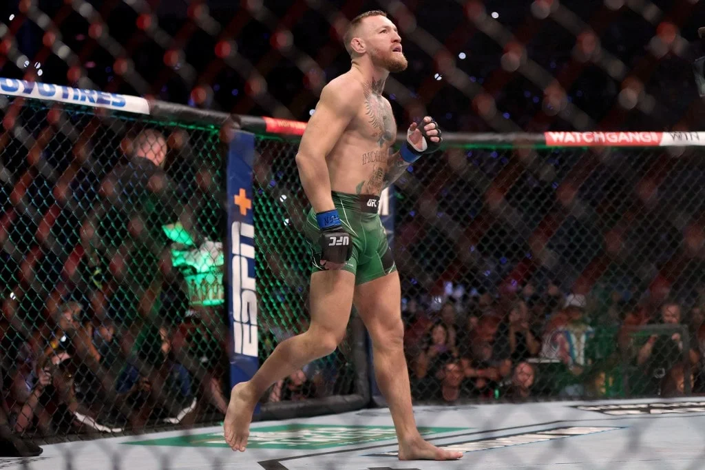 Conor McGregor of Ireland walks in the octagon before his lightweight bought