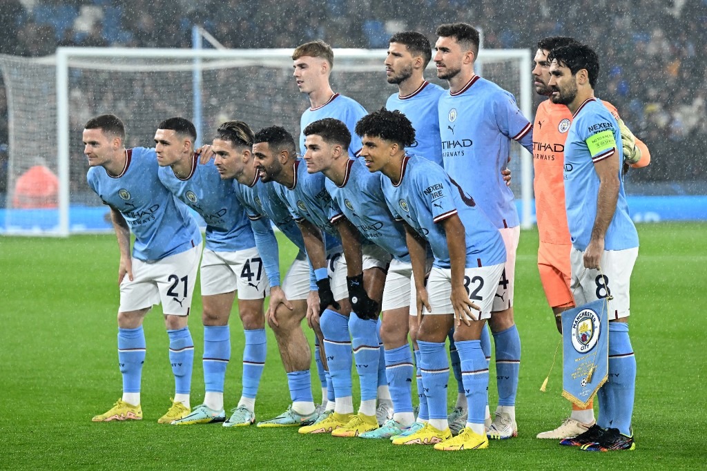 Manchester City team pose for a picture prior to the UEFA Champions League group G football match between Manchester City and Sevilla