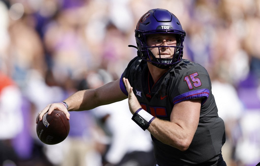 Max Duggan #15 of the TCU Horned Frogs throws against the Oklahoma State Cowboys