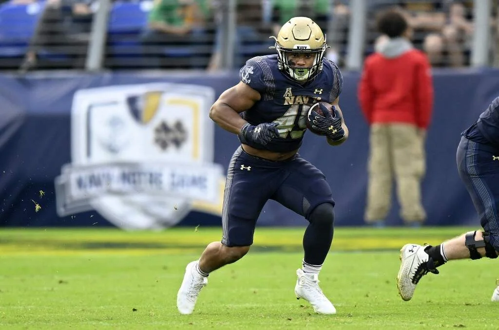 Daba Fofana #45 of the Navy Midshipmen rushes the ball