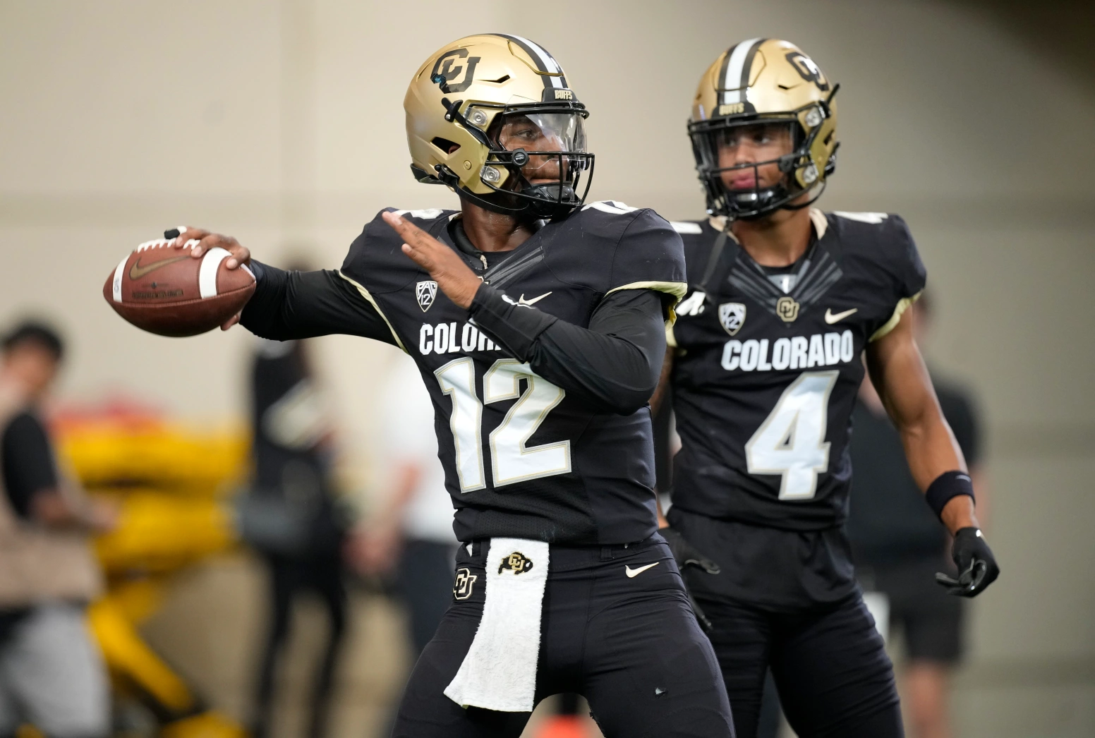 Colorado quarterback Brendon Lewis warms up before the Buffs’ game against TCU