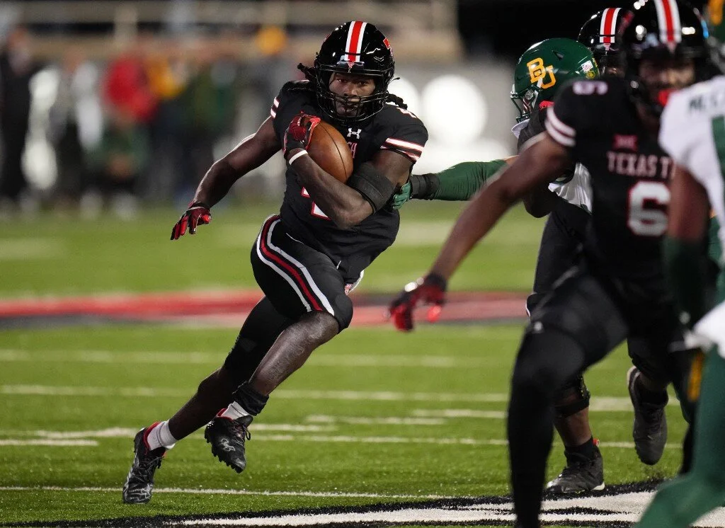 SaRodorick Thompson #4 of the Texas Tech Red Raiders rushes during the second half against the Baylor Bears