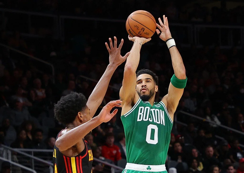 Jayson Tatum #0 of the Boston Celtics attempts a three-point basket