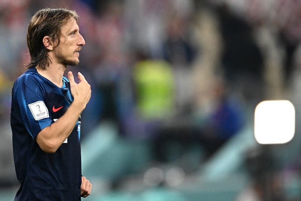 Croatia's midfielder #10 Luka Modric reacts after his team lost the Qatar 2022 World Cup football semi-final