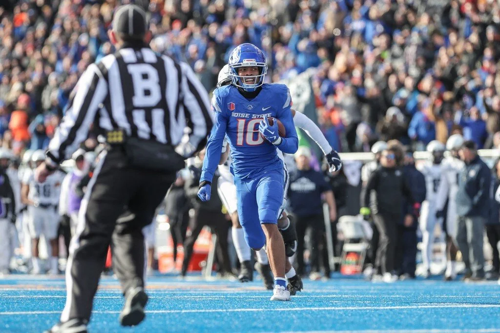 Wide receiver Billy Bowens #18 of the Boise State Broncos surveys an open field after a catch
