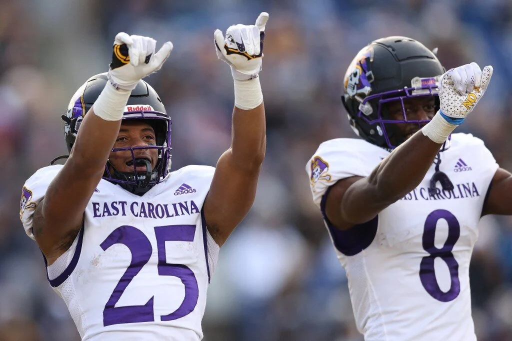 Keaton Mitchell #25 of the East Carolina Pirates celebrates his touchdown
