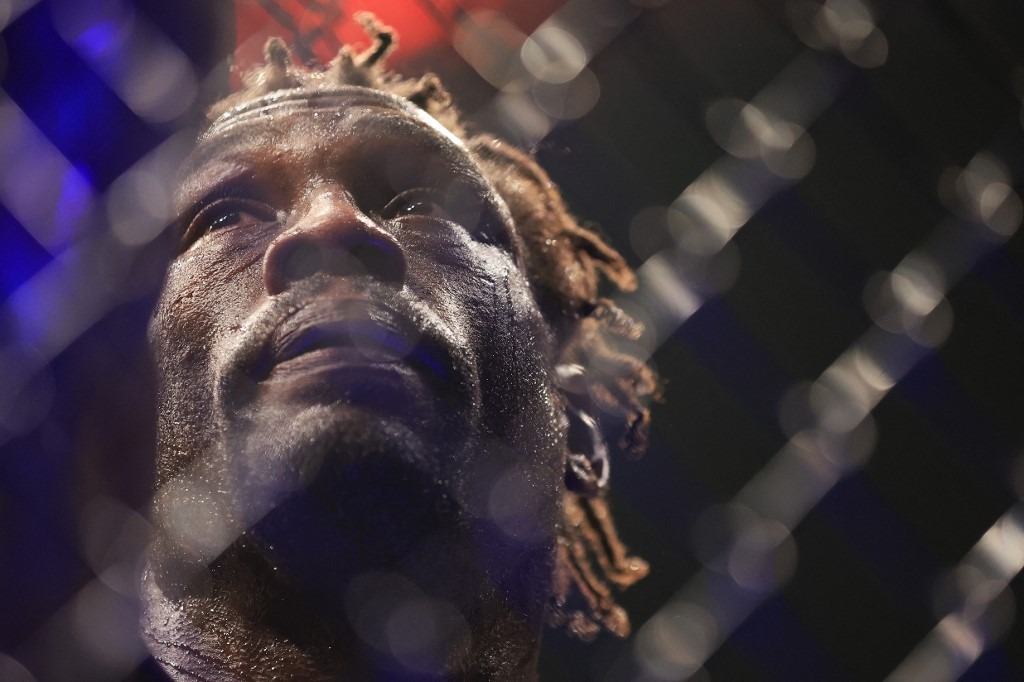 Jared Cannonier reacts after his middleweight title bout against Israel Adesanya of Nigeria during UFC 276