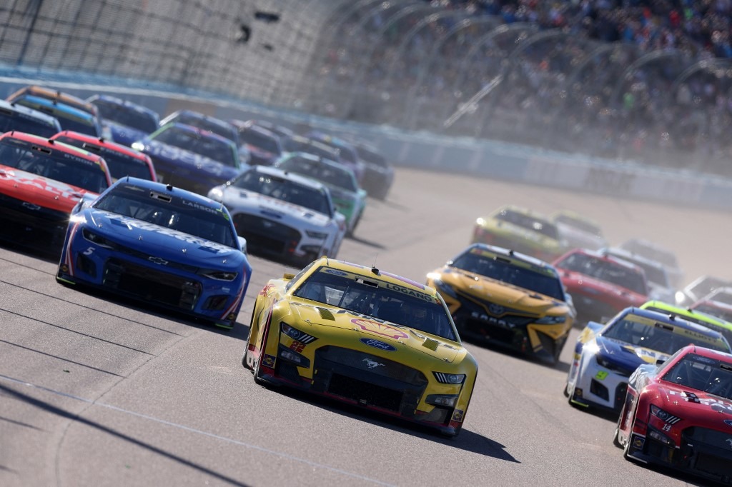 Chastain, driver of the #1 Worldwide Express/Advent Health Chevrolet, leads the field during the NASCAR Cup Series Championship at Phoenix Raceway