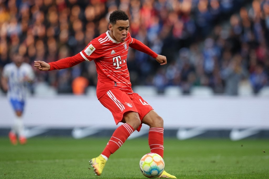 Bayern Munich's German midfielder Jamal Musiala scores the 0-1 goal