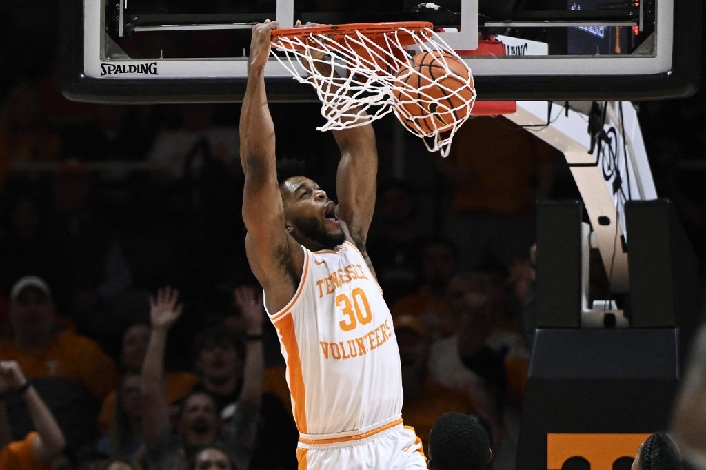 Josiah-Jordan James #30 of the Tennessee Volunteers completes the alley-oop against the Mississippi State Bulldogs