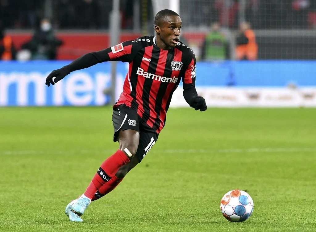 Leverkusen's French forward Moussa Diaby runs with the ball during the German first division Bundesliga football match