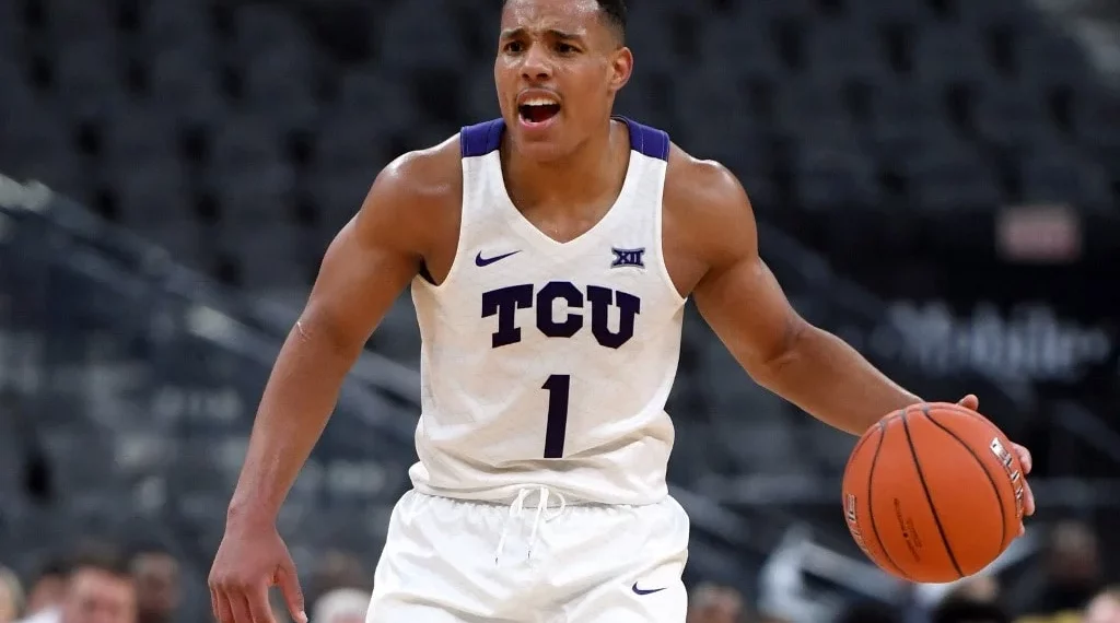 Desmond Bane #1 of the TCU Horned Frogs brings the ball up the court against the Clemson Tigers 