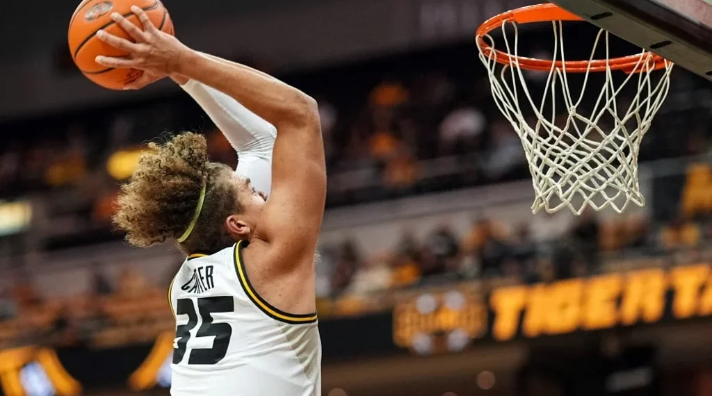 Noah Carter #35 of the Missouri Tigers dunks the ball during the second half against the Southern Indiana Screaming Eagles