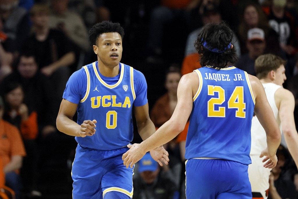 Jaylen Clark #0 of the UCLA Bruins celebrates a basket with teammate Jaime Jaquez Jr. #24 during the first half against the Oregon State Beavers