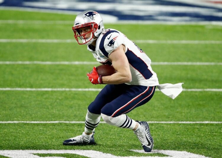 Chris Hogan #15 of the New England Patriots makes a catch against the Philadelphia EaglePhiladelphia Eagles during the second quarter in Super Bowl LII at U.S. Bank Stadium on February 4, 2018