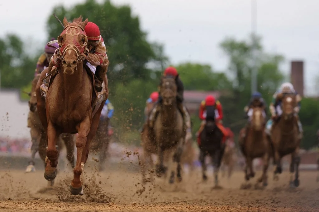 Rich Strike with Sonny Leon up wins the 148th running of the Kentucky Derby