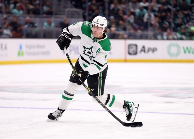Miro Heiskanen #4 of the Dallas Stars shoots against the Seattle Kraken during the first period at Climate Pledge Arena on March 13, 2023