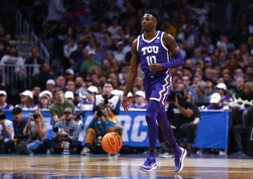 Damion Baugh #10 of the TCU Horned Frogs dribbles the ball during the first half - Justin edmonds/getty Images/afp